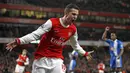 <p>Robin van Persie merupakan salah satu pemain yang berhasil menjadi top skor liga di dua klub yang berbeda. Saat berseragam Arsenal, ia berhasil mencetak 30 gol yang membuatnya memenangkan Sepatu Emas, Pemain Terbaik PFA, dan Penghargaan Pemain Terbaik FWA pada musim 2011/12. Ia juga mampu melesatkan 11 assist sebelum dirinya berubah posisi sebagai striker murni bersama The Gunners. Sementara itu, gelar Sepatu Emas pertama lainnya ia rengkuh saat bermain di Manchester United dengan menorehkan 26 gol. (AFP/Ian Kington)</p>