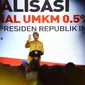 Presiden Jokowi memberikan sambutan pada sosialisasi PPh final UMKM di Sanur, Sabtu (23/6). Mengenakan pakaian adat Bali, Jokowi mensosialisasikan penurunan tarif pajak PPh kepada lebih dari seribu pelaku usaha. (Liputan6.com/Pool/Biro Pers Setpres)