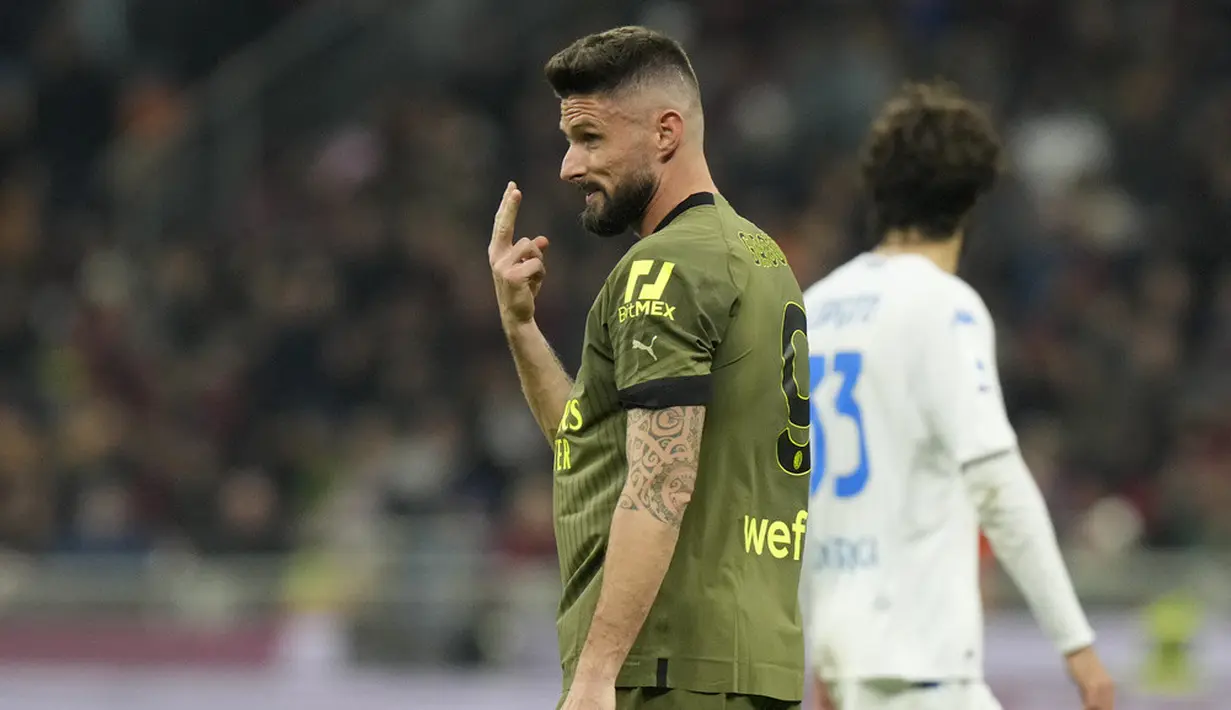 <p>Tapi, gol itu akhirnya dianulir wasit karena striker asal Prancis itu mencetak gol dengan tangan bukan dengan kepalanya. (AP Photo/Luca Bruno)</p>