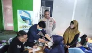 Dikepung Asap TPA Jatiwaringin, Warga Cek Kesehatan Dapat Obat dan Masker