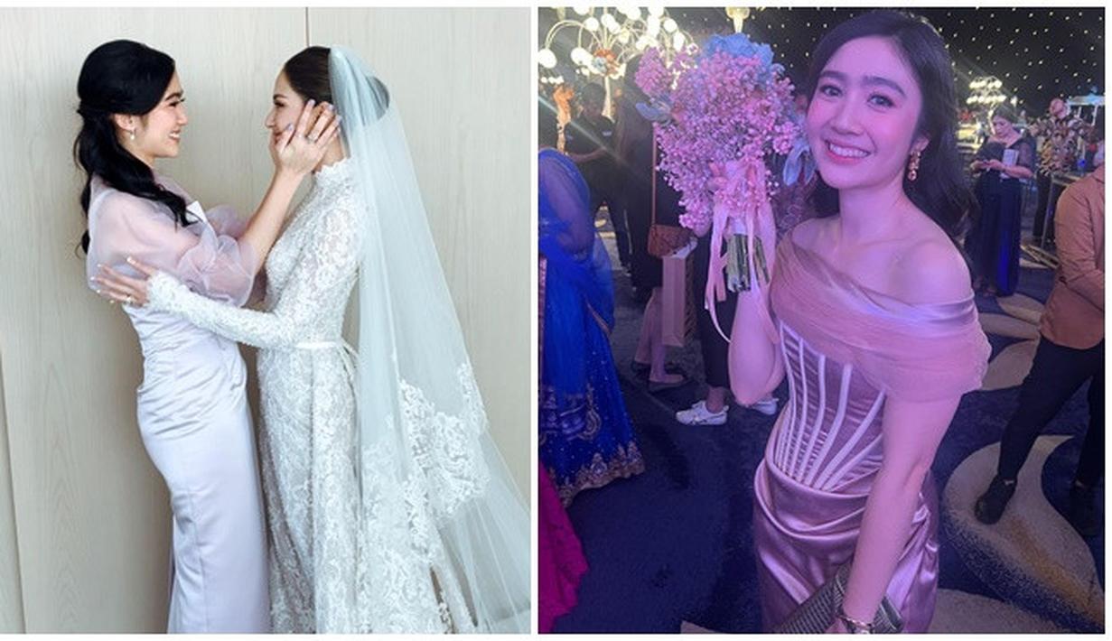 Pakai dress off shoulder dengan rambut digerai, penampilan Febby Rastanty banjir pujian ketika menjadi bridesmaid Jessica Mila saat resepsi pernikahan pada Mei 2023 lalu. Sementara saat pemberkatan, Febby Rastanty pakai dress warna ungu simpel dengan gaya rambut ikat tengah yang membuatnya makin manis. (Liputan6.com/IG/@febbyrastanty)