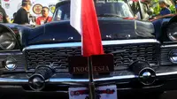 Satu dari tiga mobil kepresidenan era pemerintahan Sukarno dipamerkan di Denpasar, Bali. (Liputan6.com/Dewi Divianta)