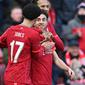 Striker Liverpool Diogo Jota merayakan gol ke gawang Cardiff City pada babak IV Piala FA 2021/2022 di Anfield, Minggu (6/2/2022). (AFP/Paul Ellis)