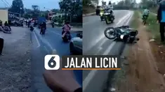 Hal tidak terduga terjadi ketika ada seorang pria sedang mengingatkan jalan licin akibat tumpahan oli yang dibawa oleh mobil.