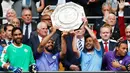 Sergio Aguero dan David Silva - Kombinasi duo Manchester City ini masuk dalam daftar duet lini serang berbahaya di Liga Inggris. Kekompakan kedua pemain ini telah menghasilkan 29 gol. (AFP/Adrian Dennis)