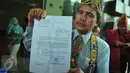 Surat laporan Pendeta Max Everton Ibrahim Tangkudung untuk Imam besar FPI Habib Rizieq ditunjukkan di kantor sementara Bareskrim di kompleks Kementerian Kelautan dan Perikanan, Jakarta, Jumat (3/3). (Liputan6.com/Faizal Fanani)