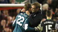 Liverpool vs Stoke City - Capital One Cup Semi Final Second Leg - Anfield - 26/1/16 Liverpool manager Juergen Klopp celebrates with Simon Mignolet after winning the penalty shootout Reuters / Phil Noble