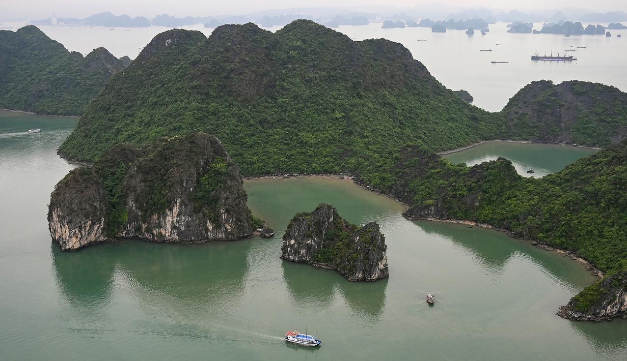 Foto Ha Long Bay Keindahan Alam Warisan Dunia Di Vietnam Lifestyle Liputan6 Com