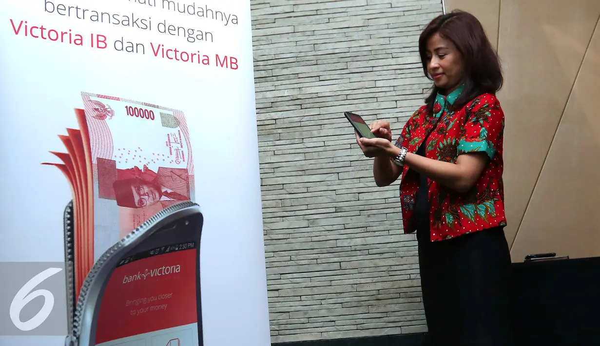PT Bank Victoria International Tbk meluncurkan layanan internet dan mobile banking, Jakarta, Kamis (9/6). Layanan terbaru ini ditujukan untuk memudahkan nasabah dalam bertransaksi. (Liputan6.com/Angga Yuniar)