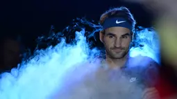 Ekspresi petenis Swiss, Roger Federer, jelang bertanding melawan petenis Jepang, Kei Nishikori, dalam turnamen ATP World Tour Finals di London, Inggris, (19/11/2015). (AFP Photo/Glyn Kirk)