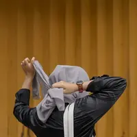 Ilustrasi perempuan berhijab. Sumber foto: unsplash.com/Nada Hanifah.