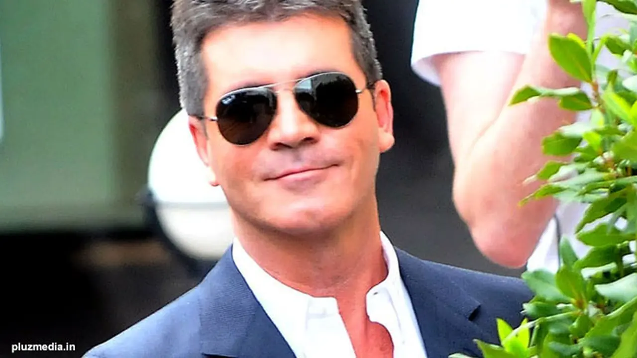 simon-cowell-kacamata-130827b.jpg