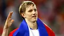Russian forward Roman Pavlyuchenko, wrapped is his country flag, celebrates after his team won the Euro 2008 Championships quarter-final football match the Netherlands vs. Russia on June 21, 2008 at St. Jakob-Park in Basel. AFP PHOTO / VALERY HACHE