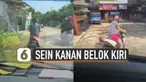 Ada-ada saja aksi pengendara motor perempuan ini ketika menghidupkan sein kanan tapi belok kiri.