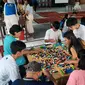 Anak-anak bermain menyusun LEGO pada acara  LEGO Program CSR dengan SOS Children’s Village di Jakarta Timur, Senin (20/05/2024). (dok. Liputan6.com/Rusmia Nely)