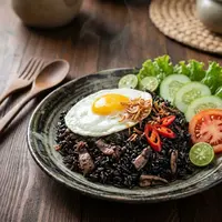 Resep nasi goreng tinta cumi anti amis (AI generated)