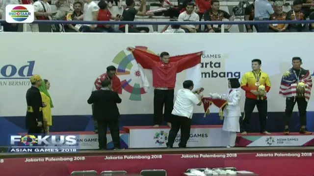 Aji Bangkit Pamungkas menang telak 5-0 atas atlet pencak silat Singapura, Sheik Alauddin Sheik Ferdous.