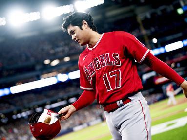 Dunia olahraga baru saja dibuat heboh setelah Shohei Ohtani menandatangani kontrak dengan Los Angeles Dodgers selama 10 tahun dengan nilai menacapai 700 juta dolar Amerika Serikat atau sekitar 10,8 triliun rupiah. (Getty Images/AFP/Mark Blinch)