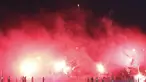 Pendukung PSS Sleman, Brigata Curva Sud menyalakan suar usai laga Piala Kemerdekaan menghadapi Persepam Madura United di Stadion Wilis, Madiun, Sabtu (15/08/2015). Persepam berhasil taklukan PSS 2-0. (Bola.com/Robby Firly)