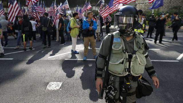 Demonstrasi digelar untuk berterima kasih kepada anggota parlemen dan presiden AS Donald Trump atas dukungannya pada Hong Kong. (AFP)
