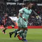 Striker Arsenal, Pierre-Emerick Aubameyang, merayakan gol yang dicetaknya ke gawang Bournemoth.  (John Walton/PA via AP)