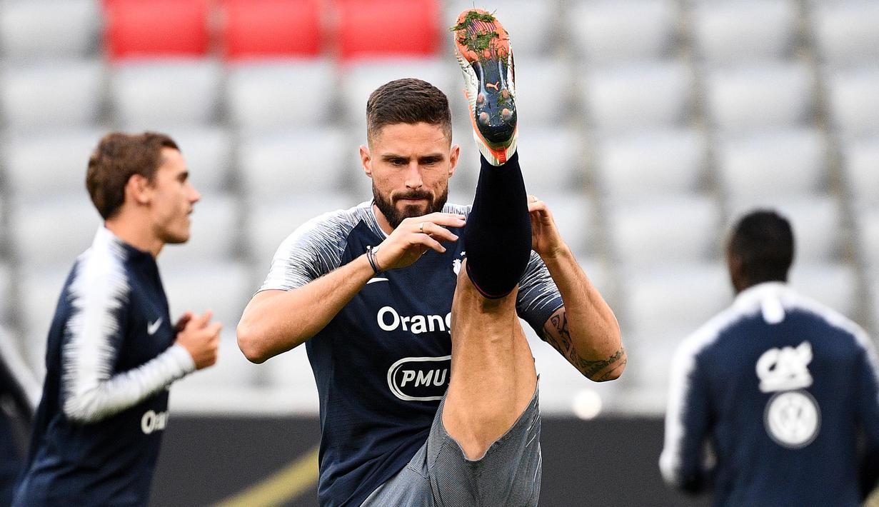 Striker Prancis, Olivier Giroud, saat melakukan sesi latihan jelang laga UEFA Nations League di Munich, Jerman, Rabu (5/9/2018). Prancis akan berhadapan dengan Jerman. (AFP/Franck Fife)