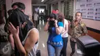 Sejumlah wanita digiring petugas menuju ruang konferensi pers di Imigrasi Kelas I Jakarta Pusat, Jumat (21/10). Sebanyak 17 WNA asal Maroko berusia 20 - 29 tahun diciduk petugas imigrasi di salah satu diskotek kawasan Senayan. (Liputan6.com/Faizal Fanani)