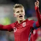 Martin Odegaard. Gelandang serang Norwegia ini melakukan debut bersama timnas senior saat berusia 15 tahun pada laga persahabatan melawan UAE yang berkesudahan 0-0, 27 Agustus 2014. Hingga kini ia telah mengoleksi 36 Caps dengan torehan 1 gol dan 7 assist. (NTB via AP/Terje Pedersen)