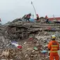 Enam ekor anjing pelacak K-9 diterjunkan untuk membantu proses evakusi korban gempa di Mamuju, Sulbar. (Foto: Liputan6.com/Abdul Rajab Umar)