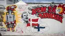 Pesan untuk bintang timnas Denmark, Christian Eriksen tertulis di dinding di Football Village di Kopenhagen, Senin (14/6/2021). Eriksen mengalami serangan jantung dan sempat tak sadarkan diri saat memperkuat timnas Denmark vs Finlandia di Euro 2020. (Mads Claus Rasmussen/Ritzau Scanpix via AP)