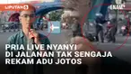Bernyanyi di jalanan sembari live media sosial belakangan menjadi tren di berbagai wilayah. Tak hanya meraup atensi dan rupiah, para penyanyi live tak jarang merekam insiden tak terduga di jalanan. Seperti yang terjadi pada penyanyi pria berikut ini ...