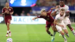 Kanada berhasil mengunci tiket berlaga di babak semifinal Copa America 2024. (CHARLY TRIBALLEAU/AFP)