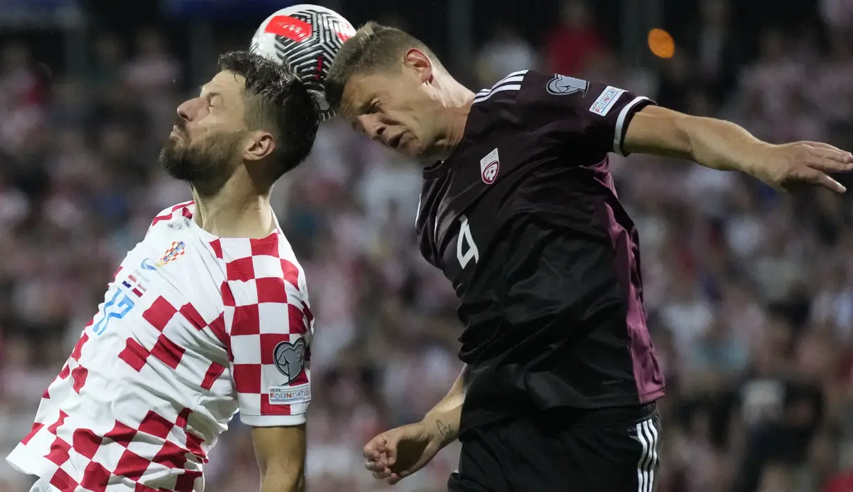 Di sisi lain, Latvia makin terpuruk di posisi paling buncit karena selalu kalah dalam empat laga yang telah dilakoni. (AP Photo/Darko Bandic)