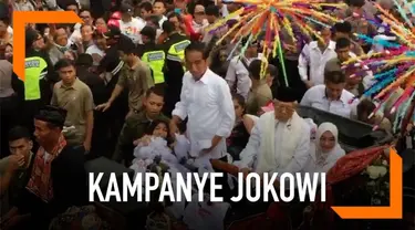 Capres Cawapres Jokowi-Ma'ruf diarak kereta kencana saat berkampanye di Tangerang, Banten. Keduanya berkampanye di Tangerang untuk menaikkan suara di Banten.