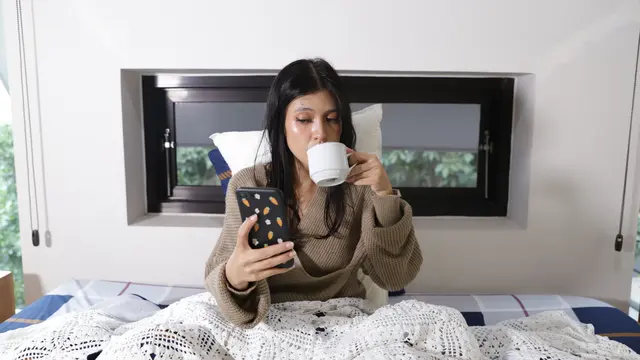 wanita desember ponsel