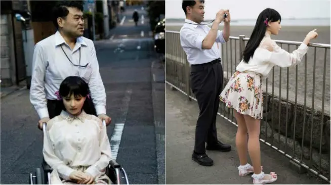 Masayuki Ozaki berjalan-jalan romantis dengan boneka seks miliknya. (Sumber AFP/Behrouz Mehri)