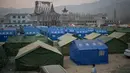 Suasana tenda-tenda bantuan pada 20 Desember setelah suhu semalam anjlok di bawah nol derajat Celcius. (PEDRO PARDO/AFP)