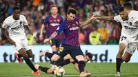 Lionel Messi berhasil mencetak satu gol saat Barcelona bersua Valencia pada final Copa del Rey di Estadio Benito Villamarin, Sabtu (25/5/2019). Meski begitu, Barca tetap kalah 1-2 dari Valencia. (AFPJose Jordan)