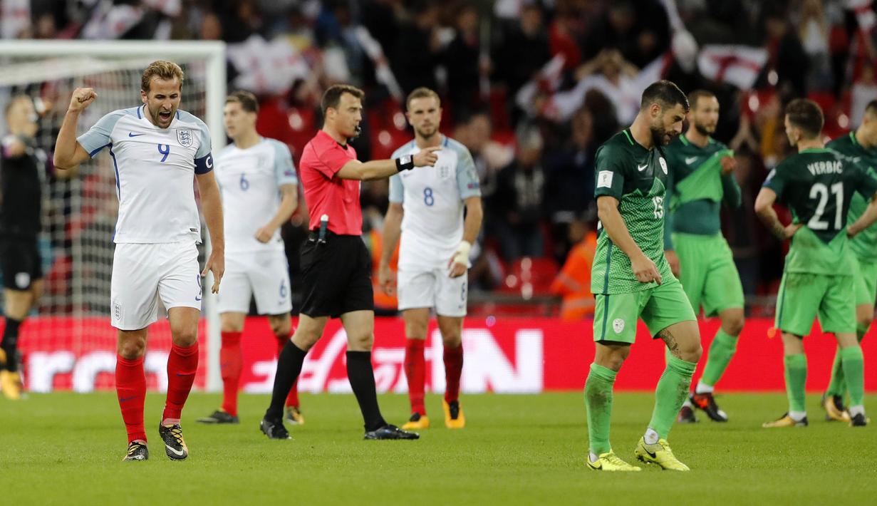 Striker Inggris, Harry Kane, melakukan selebrasi usai Inggris mengalahkan Slovenia pada laga Kualifikasi Piala Dunia 2018 di Stadion Wembley, Kamis (5/10/2017). Inggris menang 1-0 atas Slovenia. (AP/Frank Augstein)