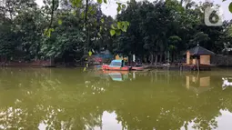 Suasana Waduk Rawa Dongkal di kawasan Cibubur, Jakarta Timur, Rabu (29/7/2020). Penataan waduk ini akan menggandeng pihak swasta melalui program penataan kawasan 1.000 danau. (Liputan6.com/Immanuel Antonius)