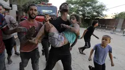 Hanya dalam 25 hari perang, lebih dari 3.600 anak Palestina telah terbunuh di Gaza, menurut Kementerian Kesehatan Gaza yang dikelola Hamas. (AP Photo/Abed Khaled)