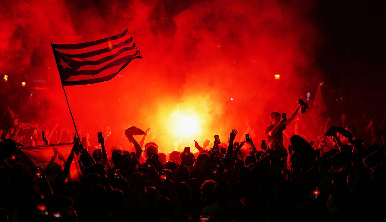Sementara itu, ini menjadi gelar Liga Spanyol yang ke-29 bagi klub Catalan tersebut. (AP Photo/Joan Mateu Parra)