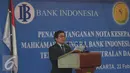 Muliaman D. Hadad memberikan kata sambutan saat penandatanganan Nota Kesepahaman, Jakarta, Senin (22/2). BI dan OJK menjalin kerjasama dengan MA untuk meningkatkan wawasan hakim di bidang kebanksentralan dan jasa keuangan. (Liputan6.com/Angga Yuniar)