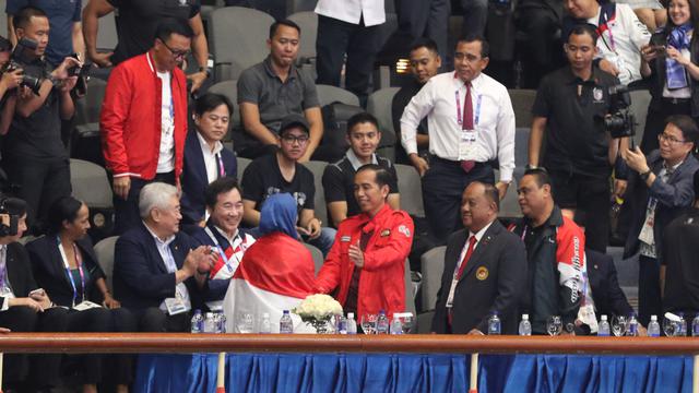 Atlet taekwondo Indonesia, Defia Rosmaniar, meraih medali emas di Asian Games 2018 (Liputan6.com / Helmi Fithriansyah)