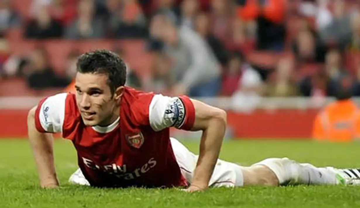 Ekspresi striker Arsenal Robin van Persie ketika The GUnners diimbangi 0-0 Blackburn Rovers dalam laga lanjutan Liga Premier di Emirates Stadium, 2 April 2011. AFP PHOTO/OLLY GREENWOOD