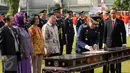 Menteri Hukum dan HAM, Yasonna H Laoly (kedua kanan) menandatangani MoU dengan pihak terkait saat peringatan Hari Pemasyarakatan ke-52 di Jakarta, Rabu (27/4/2016). Upacara disertai deklarasi melawan narkoba. (Liputan6.com/Helmi Fithriansyah)
