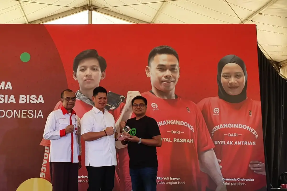 Sesmenpora, Gatot Dewa Broto, Ketua KOI, Raja Sapta Oktohari, dan Group Chief Marketing Officer Gojek, Ainul Yaqin.