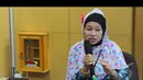 Esin Kuraesin yang berprofesi sebagai TKW ini menceritakan kepada KPK tentang perlakuan yang dialaminya saat dimintai uang oleh oknum di Bandara Soekarno-Hatta, Jakarta, Rabu (6/8/2014) (Liputan6.com/Andrian M Tunay)