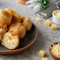 Resep Tape Goreng Isi Keju dengan Balutan Tepung Renyah/AI Generated