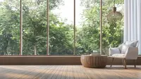 Ilustrasi ruang tamu modern dengan pemandangan taman hijau (iStockphoto)